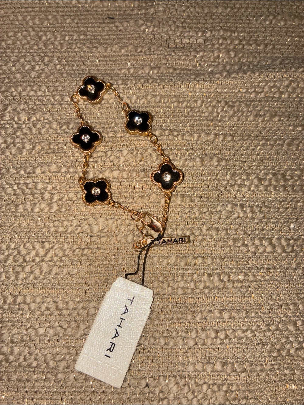 Tahari Gold and Black Clover Link Bracelet